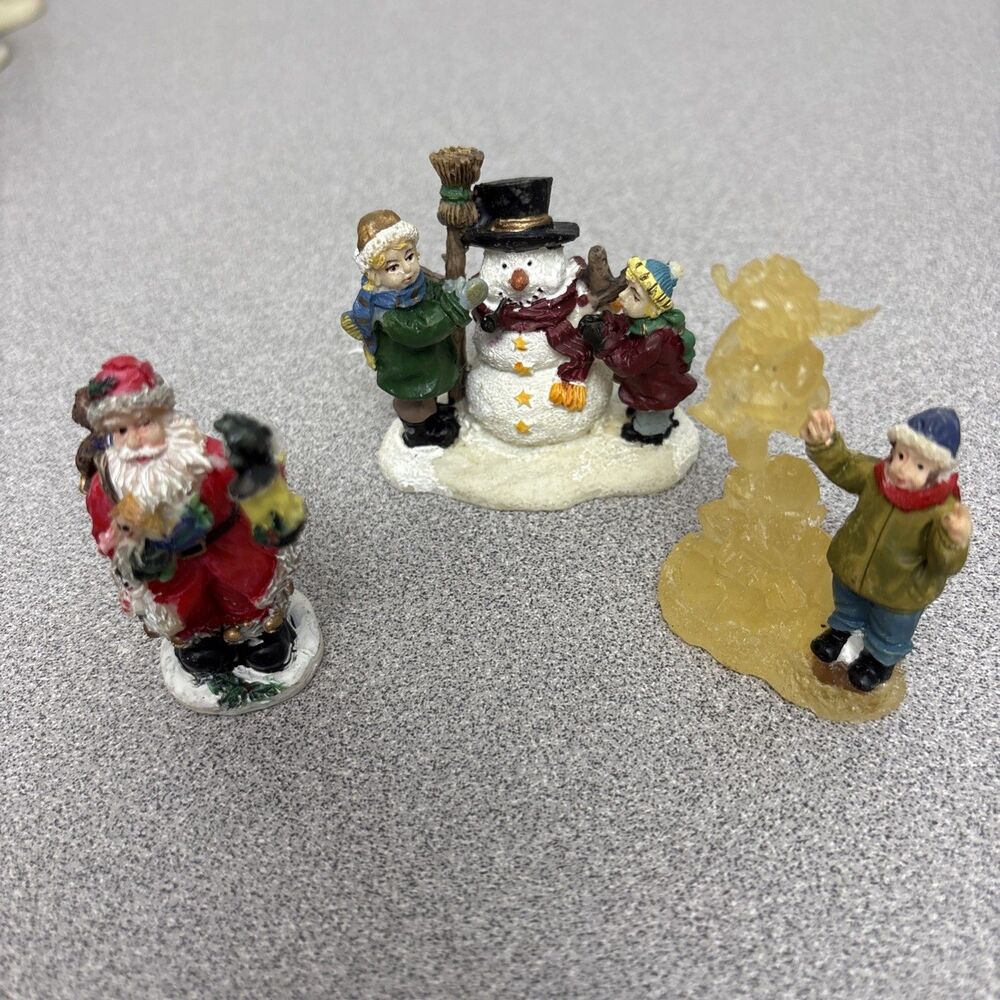 (3) Lemax Christmas Village Figurines, Santa, Making Snowman, And Ice Angel